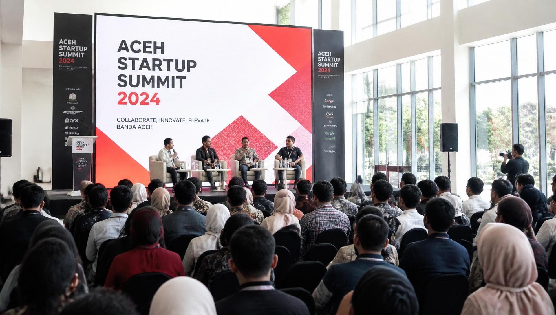 Aceh Startup Summit — panggung diskusi dengan pencahayaan cerah
